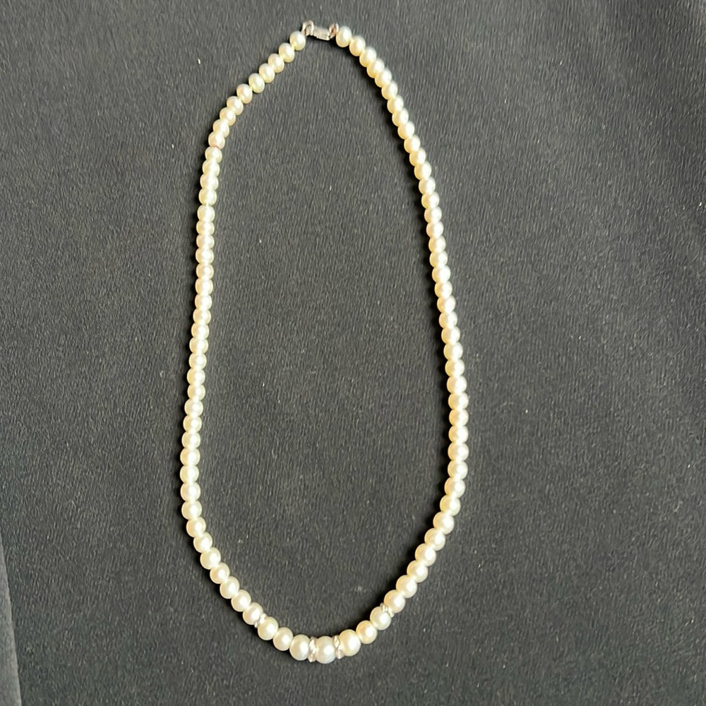 Make An Offer! Pearls/fresh water, 4, 18k Gold beads & 18k clasp. It’s a choker.